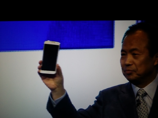 president J.K. Shin shows off the Galaxy S5